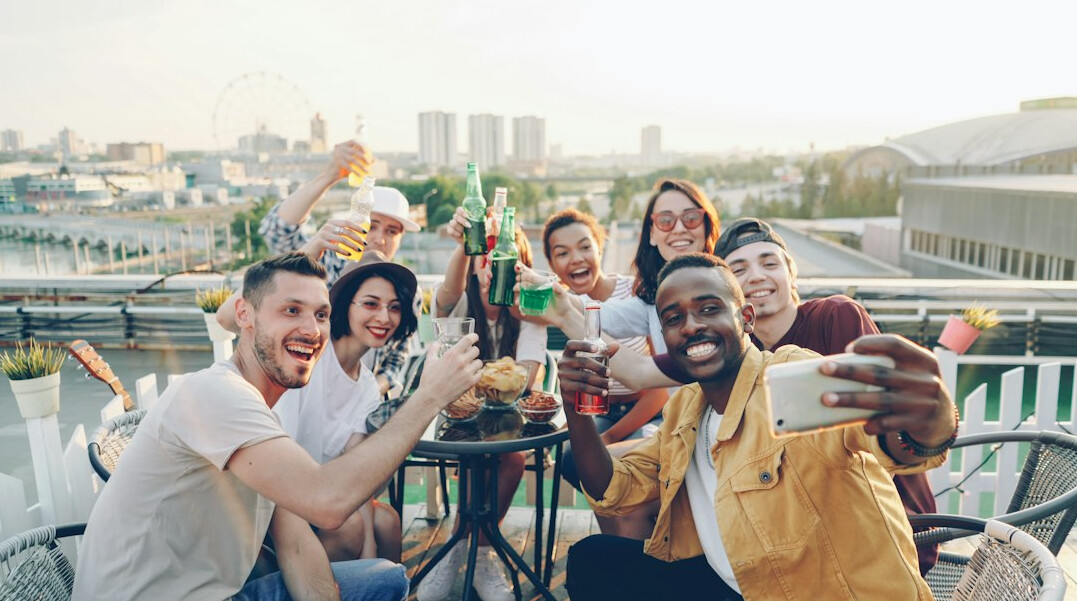 group of friends taking selfie