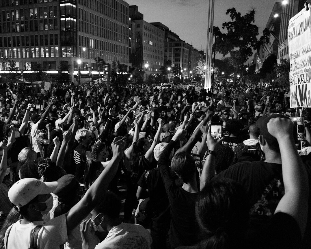 crowd of people protesting