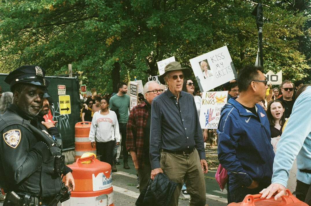 protesters marching in street
